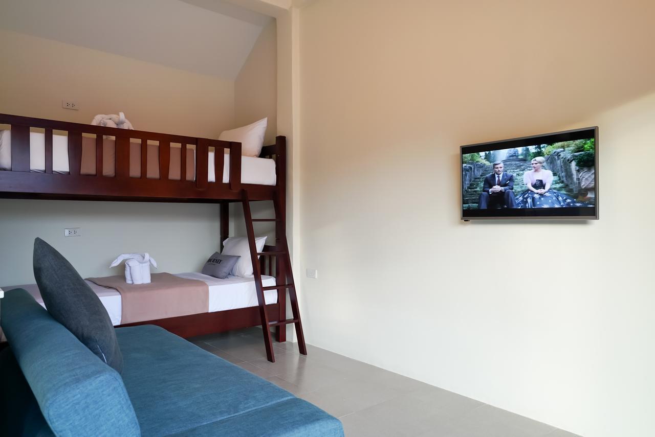 Eriksson Guesthouse Patong Номер фото